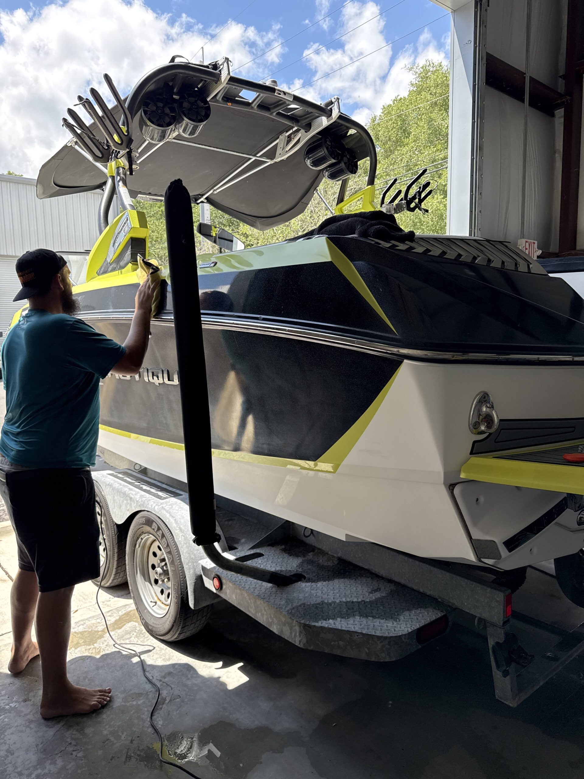 mobile detailing service Jacksonville FL - Aerial view of a car being detailed at a mobile detailing service in Jacksonville