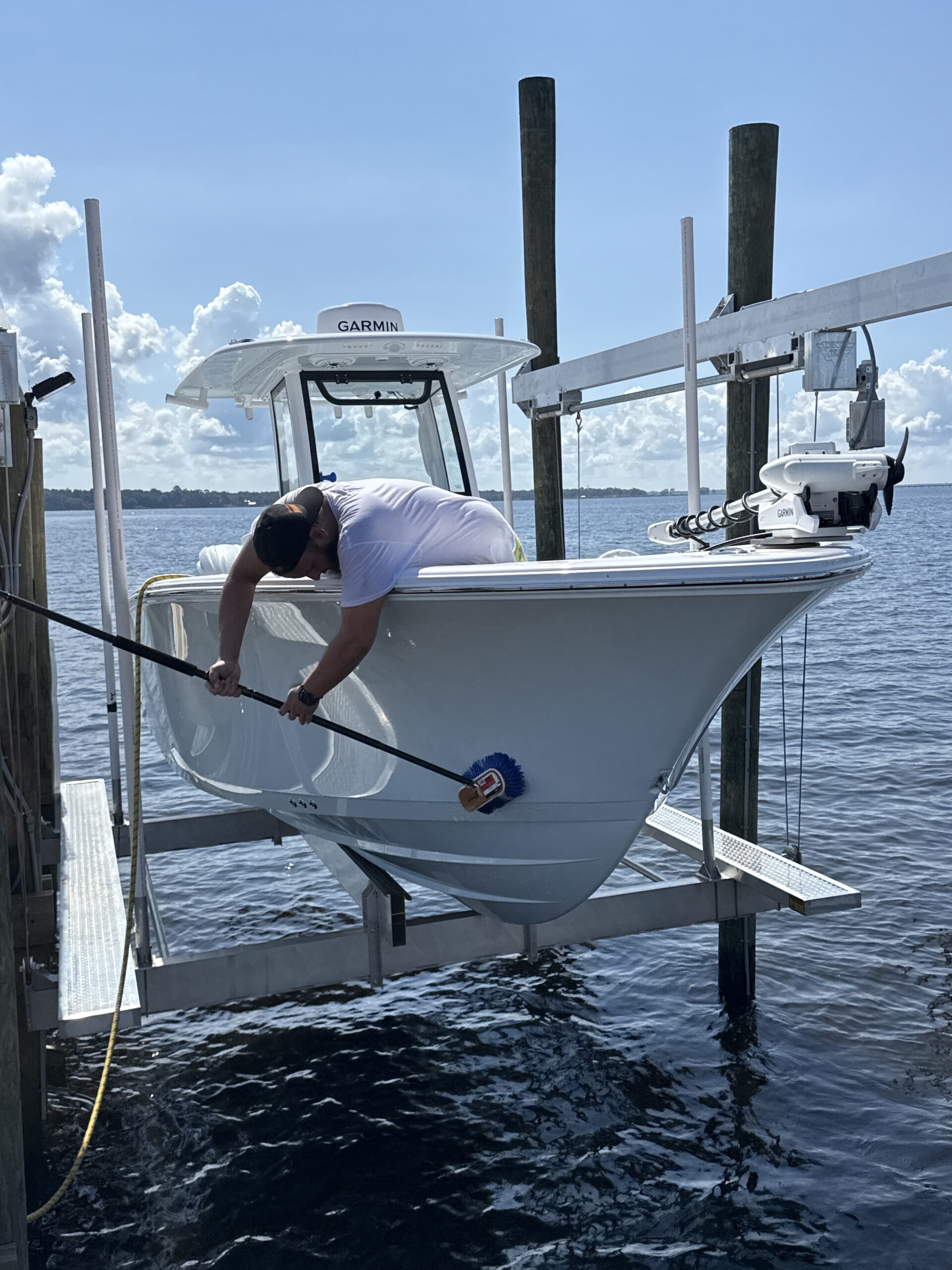 Aerial view of a car being detailed, showcasing the mobile detailing service Jacksonville FL in action.