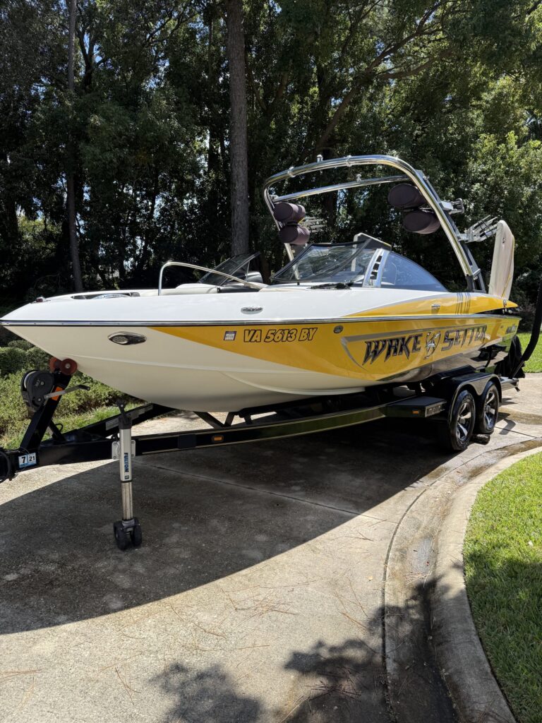 A shiny, detailed car exterior reflecting sunlight, showcasing the quality of mobile detailing service Jacksonville FL.