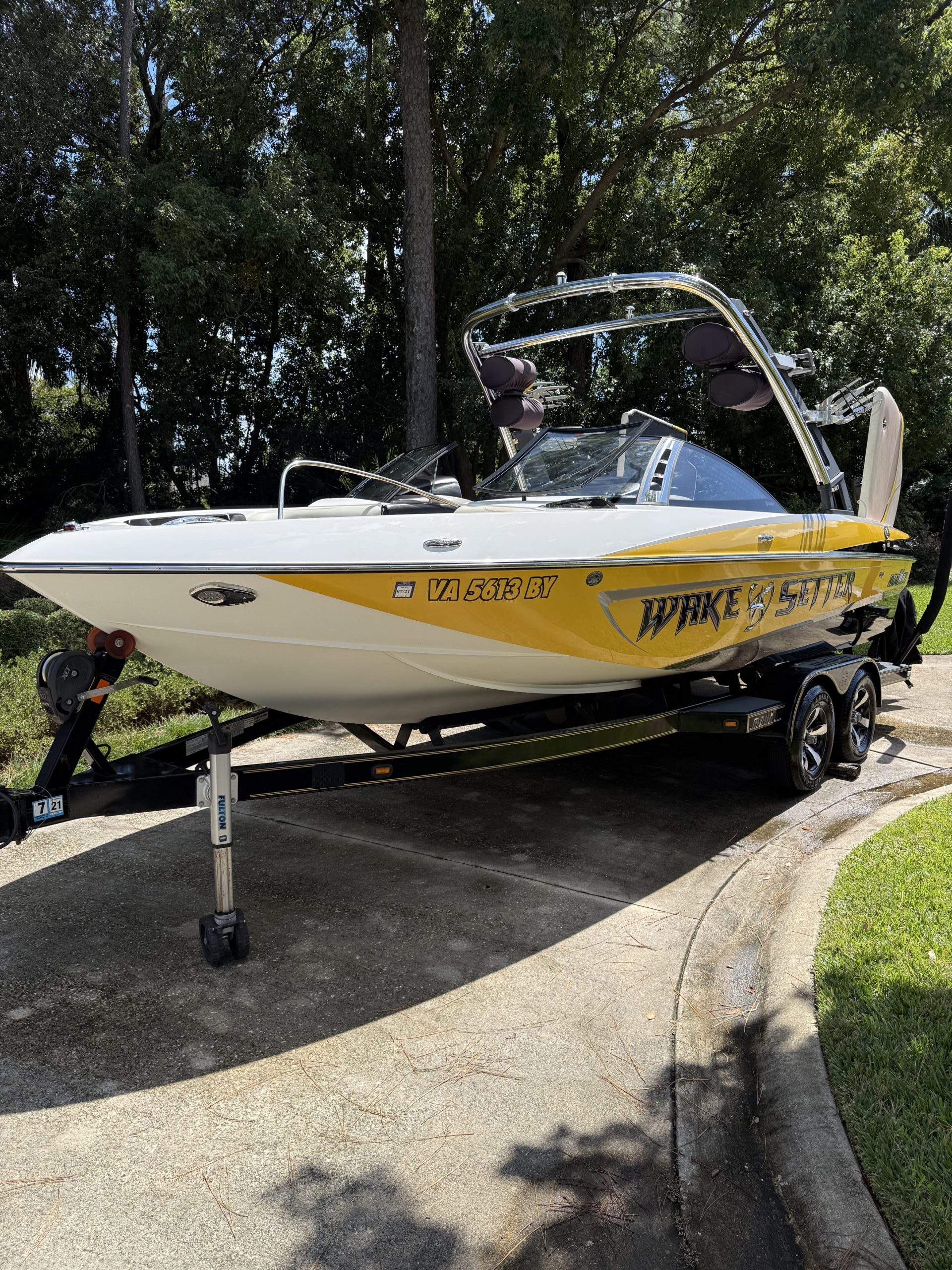 A shiny, detailed car exterior reflecting sunlight, showcasing the quality of mobile detailing service Jacksonville FL.