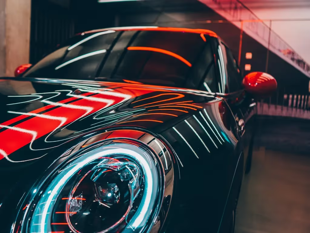 A sleek, polished car reflecting high-end detailing, showcasing the importance of high-end detailing in automotive care.