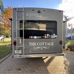 A high-resolution aerial view of a detailed car exterior showcasing the shine and finish, highlighting Moran's Performance De