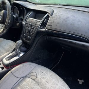 A detailed view of a polished car surface reflecting light, showcasing the quality of Moran's Performance Detailing.