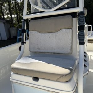 A detailed view of a shiny, polished car exterior reflecting light, showcasing the quality of Moran's Performance Detailing.