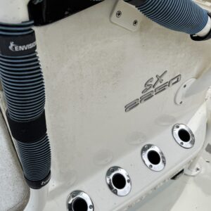 A close-up of a shiny, detailed car surface showcasing reflections and highlights, emphasizing the quality of car detailing.