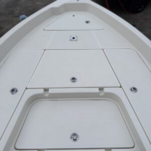 A detailed view of a shiny, well-polished car hood reflecting the surrounding environment.