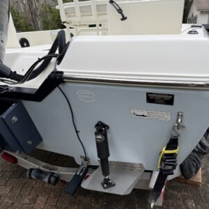 A close-up of a shiny car hood reflecting light, showcasing a high-quality car detailing service.