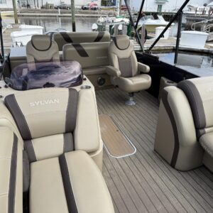 A detailed view of a car's polished surface, showcasing a high-gloss finish and reflections of surrounding objects.