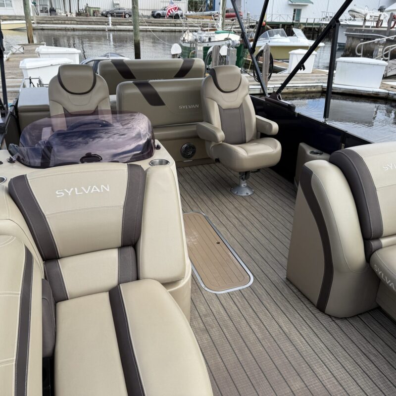 A detailed view of a car's polished surface, showcasing a high-gloss finish and reflections of surrounding objects.